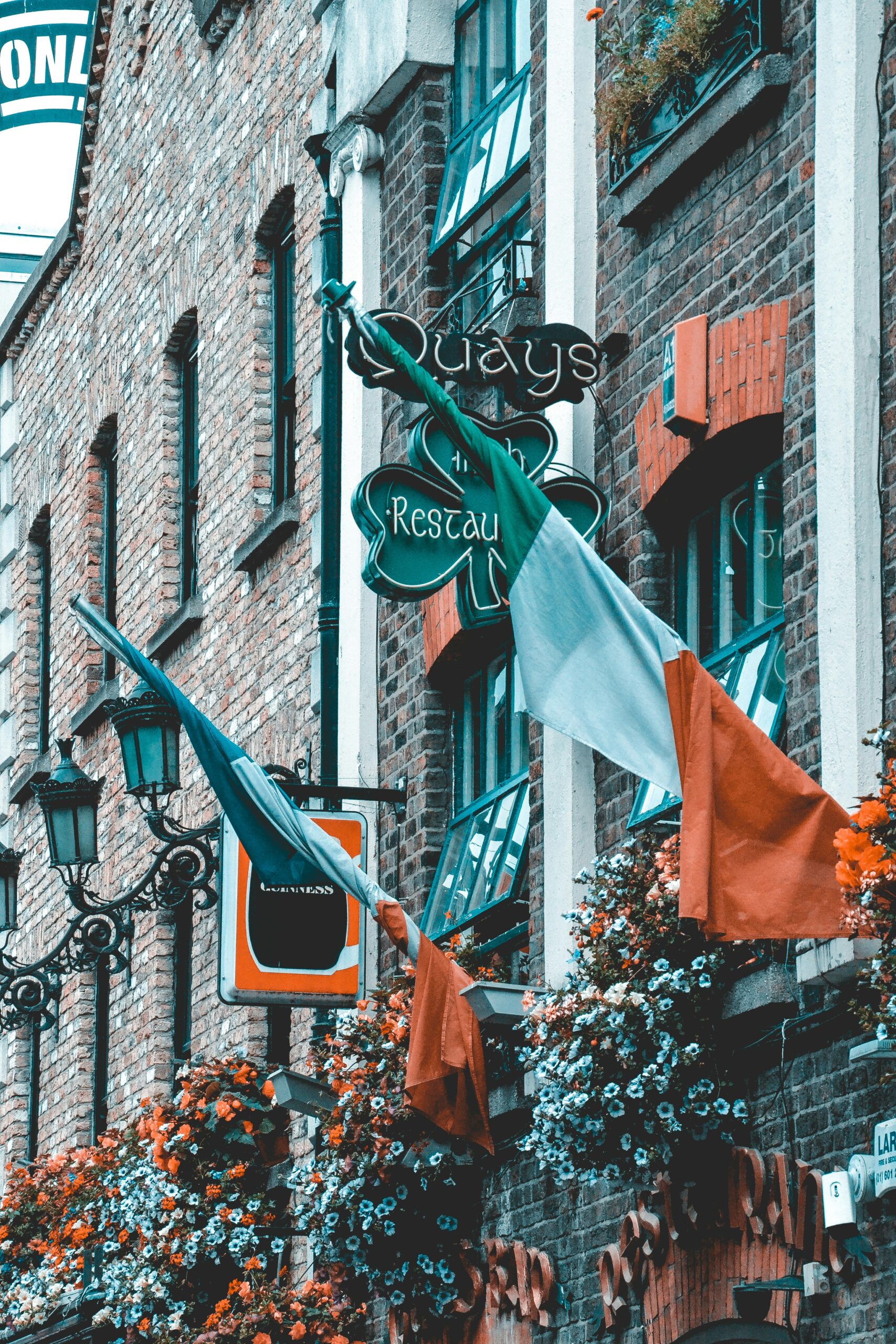 Irish flags hanging from a restaurant