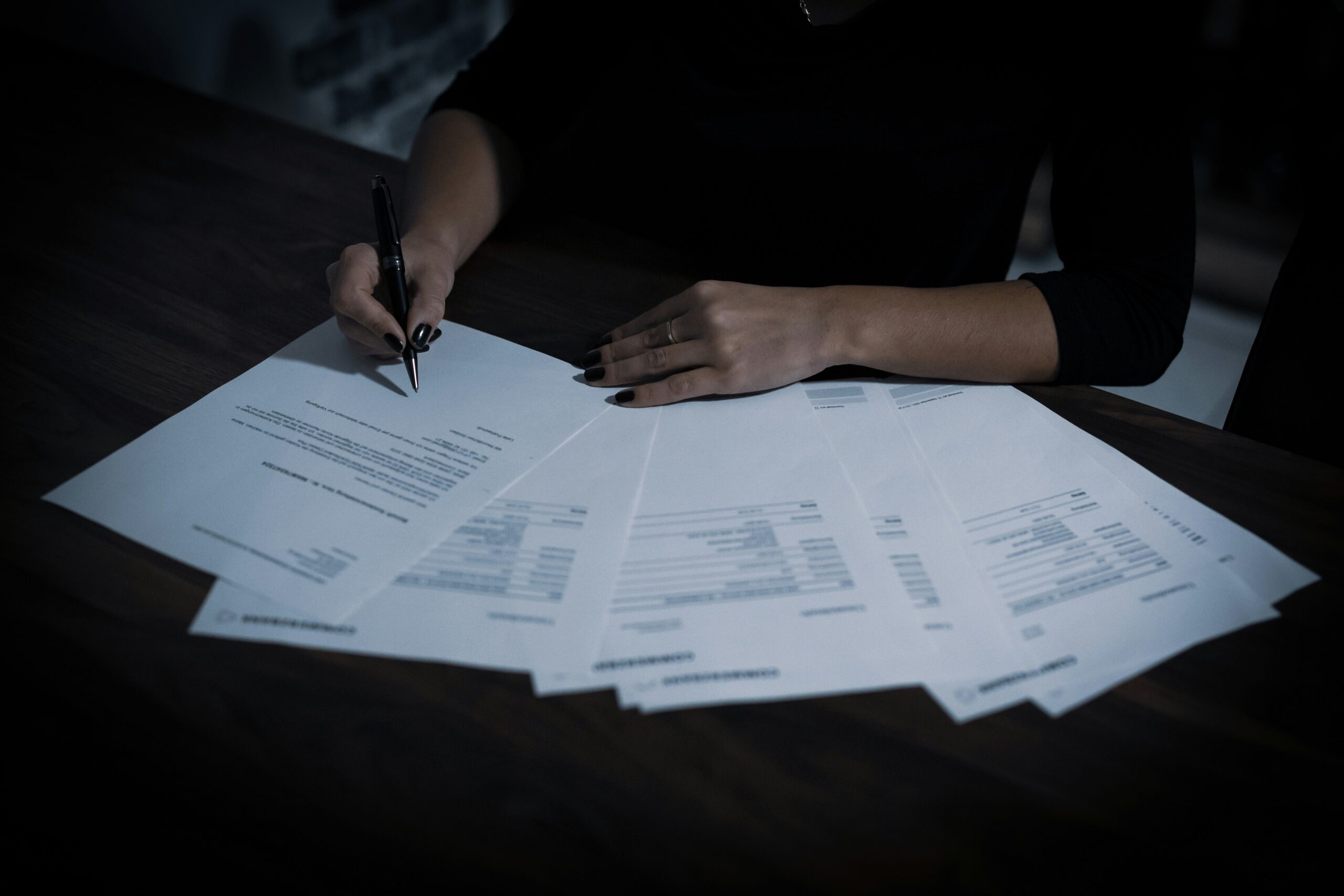Person doing paperwork regarding taxation